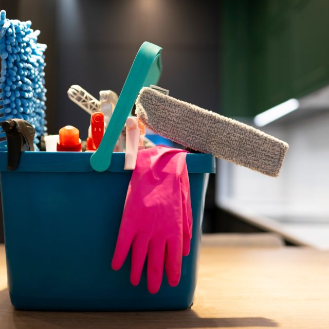 Professional cleaning bucket with accessories. Bucket full of cleaning products